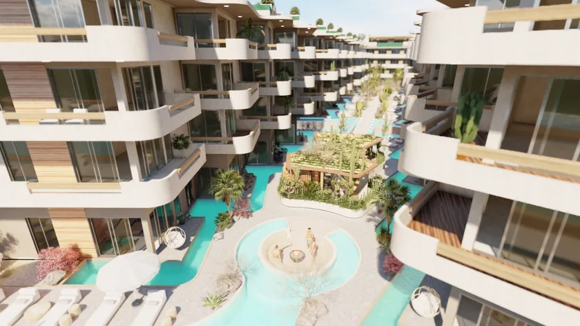 Oasis Ananta — las albercas serpenteando entre los edificios
