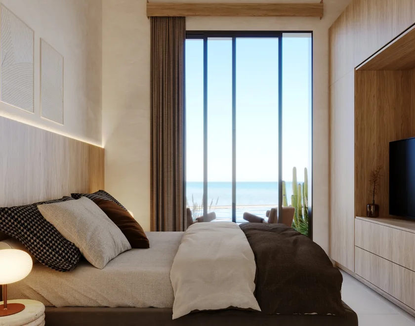 Oasis Ananta — recámara con ventanal al mar